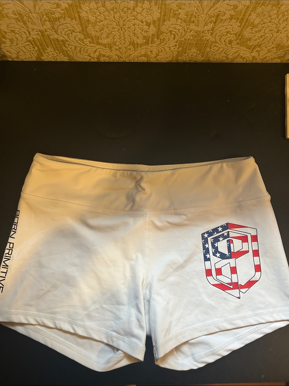 Born Primitive White Athletic Shorts with USA Flag Logo
